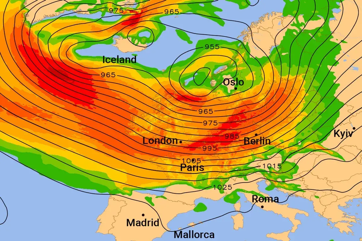 Wetterkarte zeigt Tiefdruckgebiet über Island mit roten und orangen Farbtönen. Isolinien zeigen niedrigen Luftdruck.